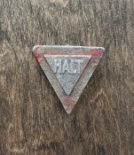 Значок “HALT”