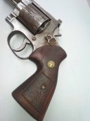 Револьвер похож на Смит-Вессон Ммг, Схп. (Smith & WESSON)