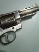 Револьвер похож на Смит-Вессон Ммг, Схп. (Smith & WESSON)