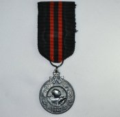 Медаль KUNNIA ISNMAA.