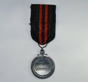 Медаль KUNNIA ISNMAA.