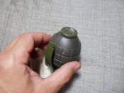 Граната - сувенир с звуковой пугалкой.