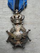 Знак Ордена Леопольда II, 5 кавалерской (рыцарской) степени (класса) с мечами.
