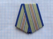 Колодка из алюминия, однослойная с лентой к медали За оборону Кавказа.