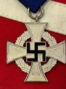 Крест за 25 лет выслуги.