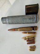 Гільзи, патрони, брелок відкривачка
