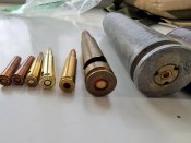 Гільзи, патрони, брелок відкривачка
