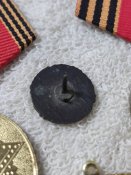 Медалі та знак УСВА.