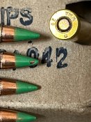 ММГ патрона 5.56 (223rem)не стрелян с оливк цв пули 2шт