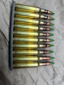 ММГ патрона 5.56 (223rem)не стрелян с оливк цв пули 2шт