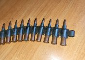 Пулеметная лента 7.62х54 мм. Вместе с ММГ патронами