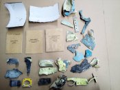 Збірний лот уламків з Ракети з Номером та Літака з підписами