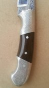 Мисливський ніж Skiner