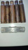 Гильзи та зарядна планка MAS-36