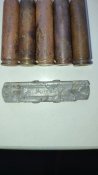 Гильзи та зарядна планка MAS-36