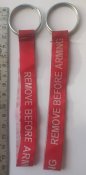 Лента з кільцем, з написом Remove before arming. Від кришки заряду 122 мм гармати. Брелок