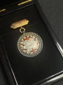 Спеціальний знак члена буддійського святилища Шіншу - храм переродження