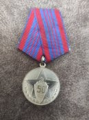 Медаль "50 лет милиции."