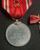 Медаль спеціального члена Товариства японського Червоного хреста з фрачним бантом