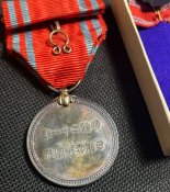 Медаль постійного члена Товариства японського Червоного хреста з фрачником