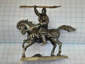 Вершник на коні зі списом