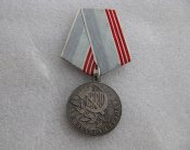 Ветеран труда с документом Долгих МЕ. Б.