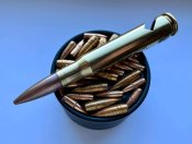 Открывашка для бутылок из макета 50 bmg ,лазерная гравировка