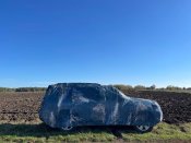 Універсальний автомобільний чохол для позашляховиків "Болото графіт"