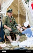 world-war-two-reenactment-german-officer-screaming-in-pain-having-F60XN0.jpg