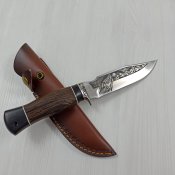Мисливський ніж в шкіряних ножнах
