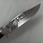 Мисливський ніж в шкіряних ножнах