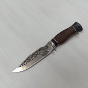 Мисливський ніж в шкіряних ножнах