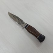 Мисливський ніж в шкіряних ножнах