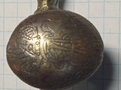 Тыльник пистоля с гравировкой