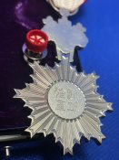 Орден Висхідного сонця 6 ступеня вручення після 60-х