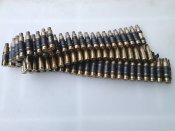 Пулеметная лента с гильзами 5.56х45