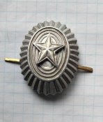 Кокарда "Орєх" та стрічка "Триколор"