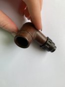 Бекелітовий ковпачок запалення.