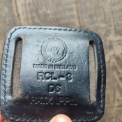Приймач палки резинової на ремені поліцейського Британії