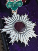 Орден Висхідного сонця 6 ступеня