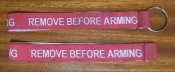 Лента з кільцем, з написом Remove before...