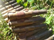 Стрічка і 54 патрона.
