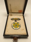 Знак спеціального члена імператорського фонду "SAISEIKAI". 1931 рік. Green Leaf