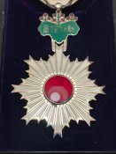 Орден Висхідного сонця 6 ступеня.