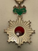 Орден Висхідного сонця 6 ступеня.