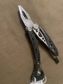 Мультитул Leatherman Skeletool CX / Лезерман Скелетул СХ