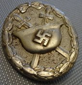 Знак "За ранение 1939" в серебре. Клейма L/55 и 100.