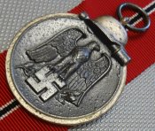 Остмедаль. Клеймо "65".