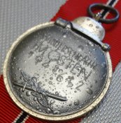 Остмедаль. Клеймо "65".