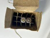 Оригінальна упаковка та два ММГ патрона...